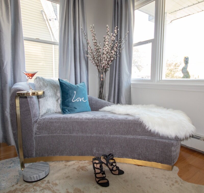 gray-velvet-chaise-lounge-in-corner-800x757.jpg