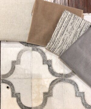 gray-creme-and-tan-color-palette-with-cowhide-rug.jpg