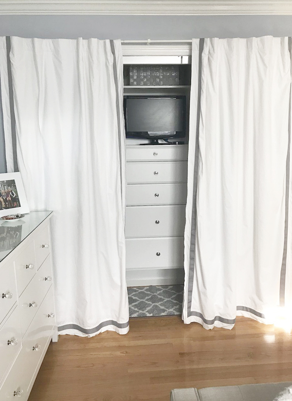 gray-teen-master-bedroom-with-tv-in-closet-600x825