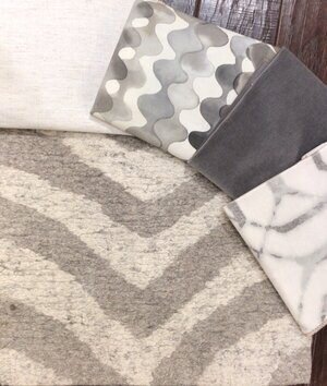 greige-creme-and-charcoal-color-palette-with-contemporary-rug.jpg