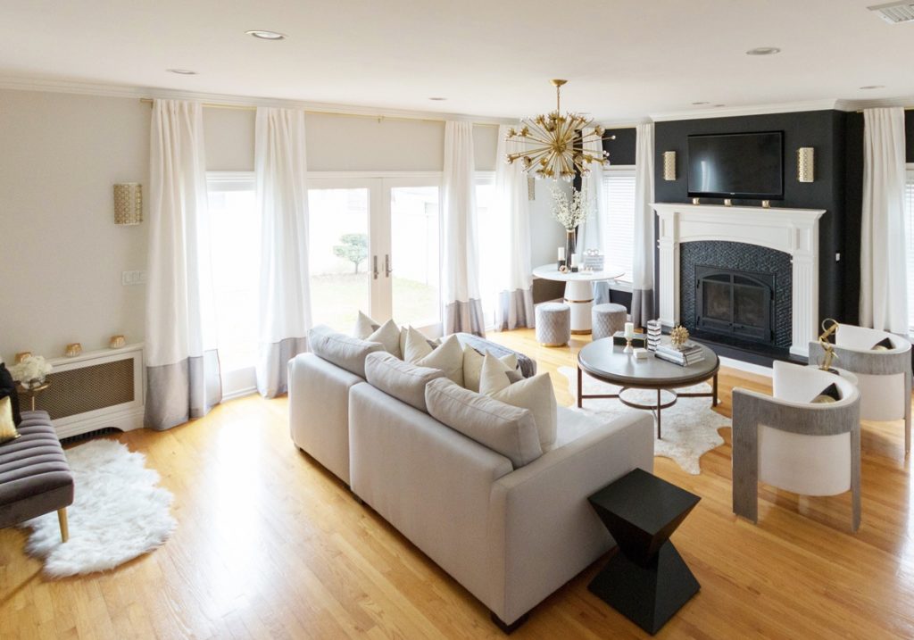 living-room-with-black-wall-and-gray-sofa-1200x840