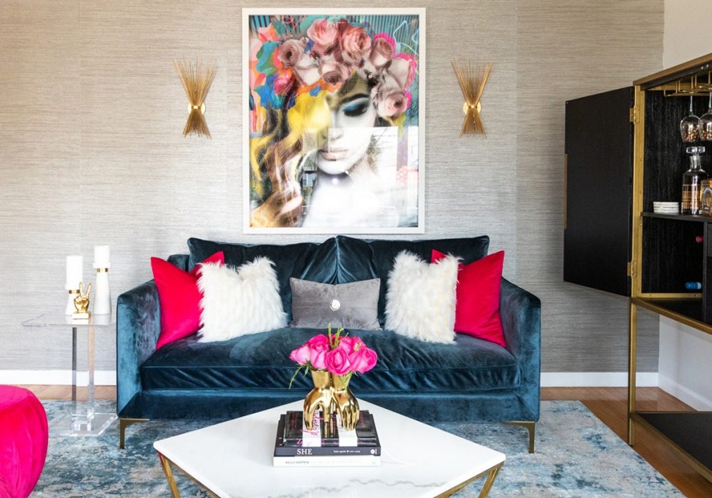 living-room-with-pink-roses-and-blue-velvet-sofa-gold-sconce-1200x840-1